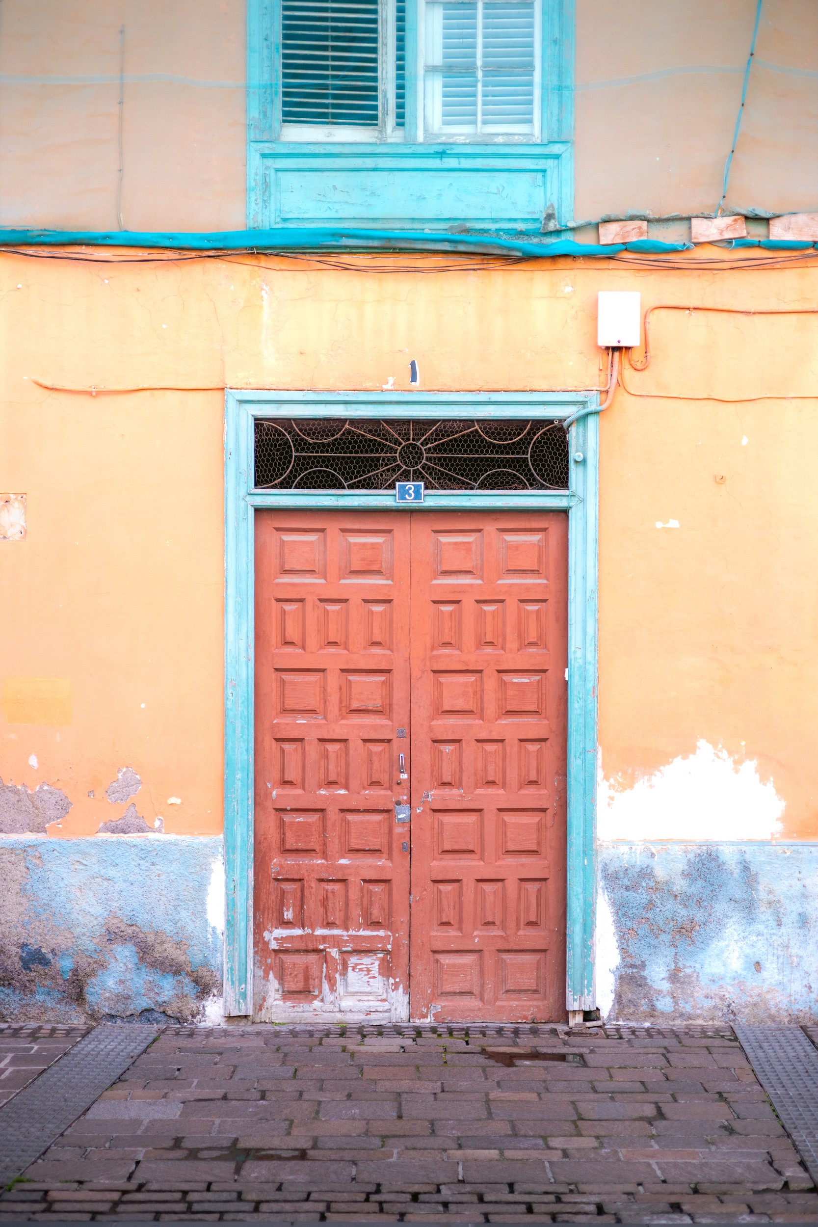 Old Orange Door by HelloHappylife — canvas wall art