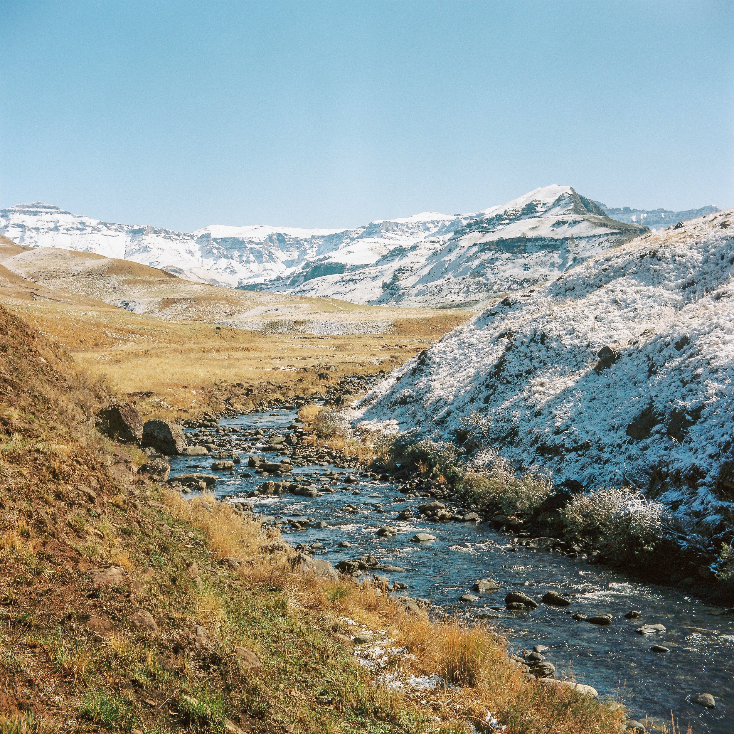 Snowy Mountain River Valley by Jesse Greaves — canvas wall art